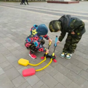 kids playing with the dual toy rocket launcher