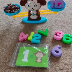 balance math game with pet figurines for kids