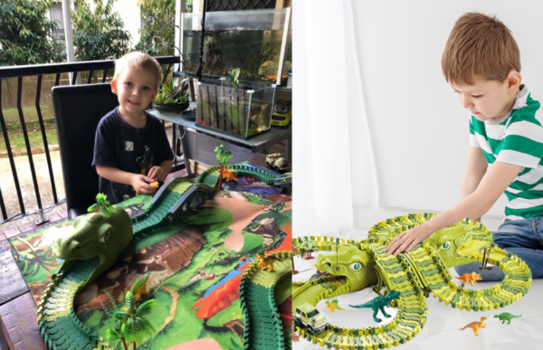 a grandson playing with the dinosaur adventure roller coaster set