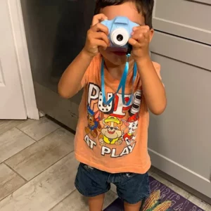 a grandson taking pictures using the littlelens camera