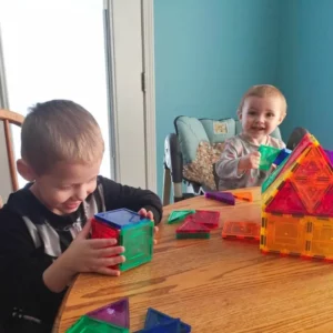 grandkids playing with the magnetic blocks at home