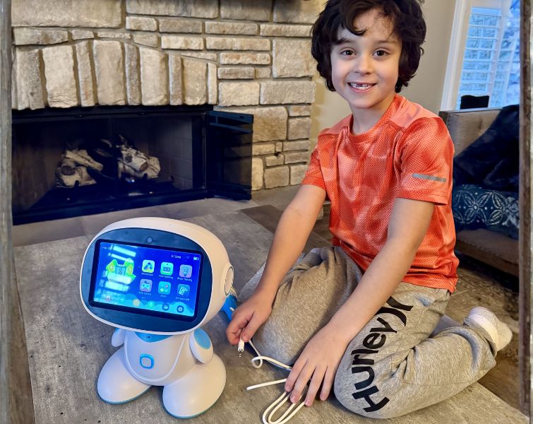 Happy kid with AI Robot