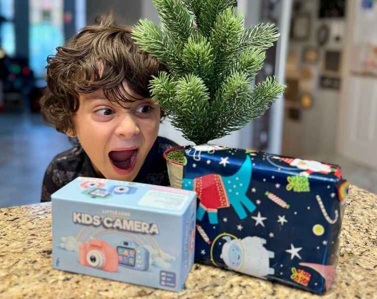 Little boy excited for LittleLens camera