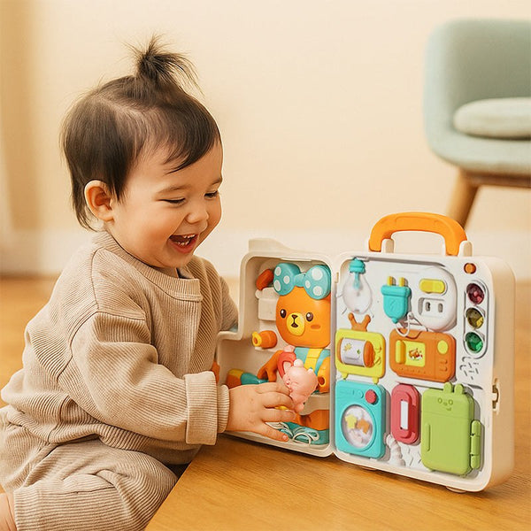 Baby playing with the Busy Board Montessori toy