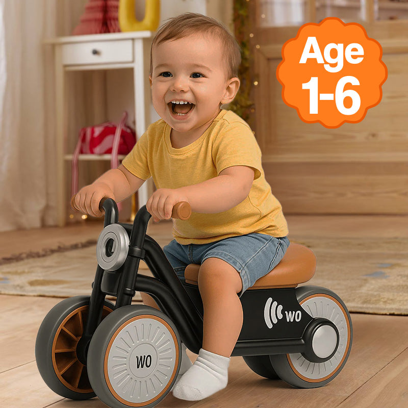 Toddler playing with the colorful Busy Board